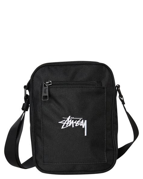 stussy luggage.